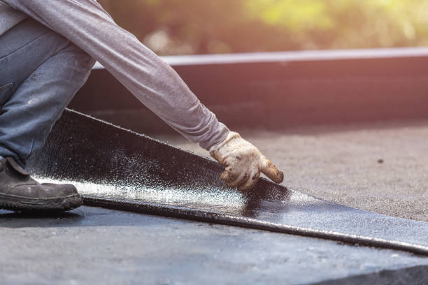 Professional Waterproofing technician working in Freetown, IN